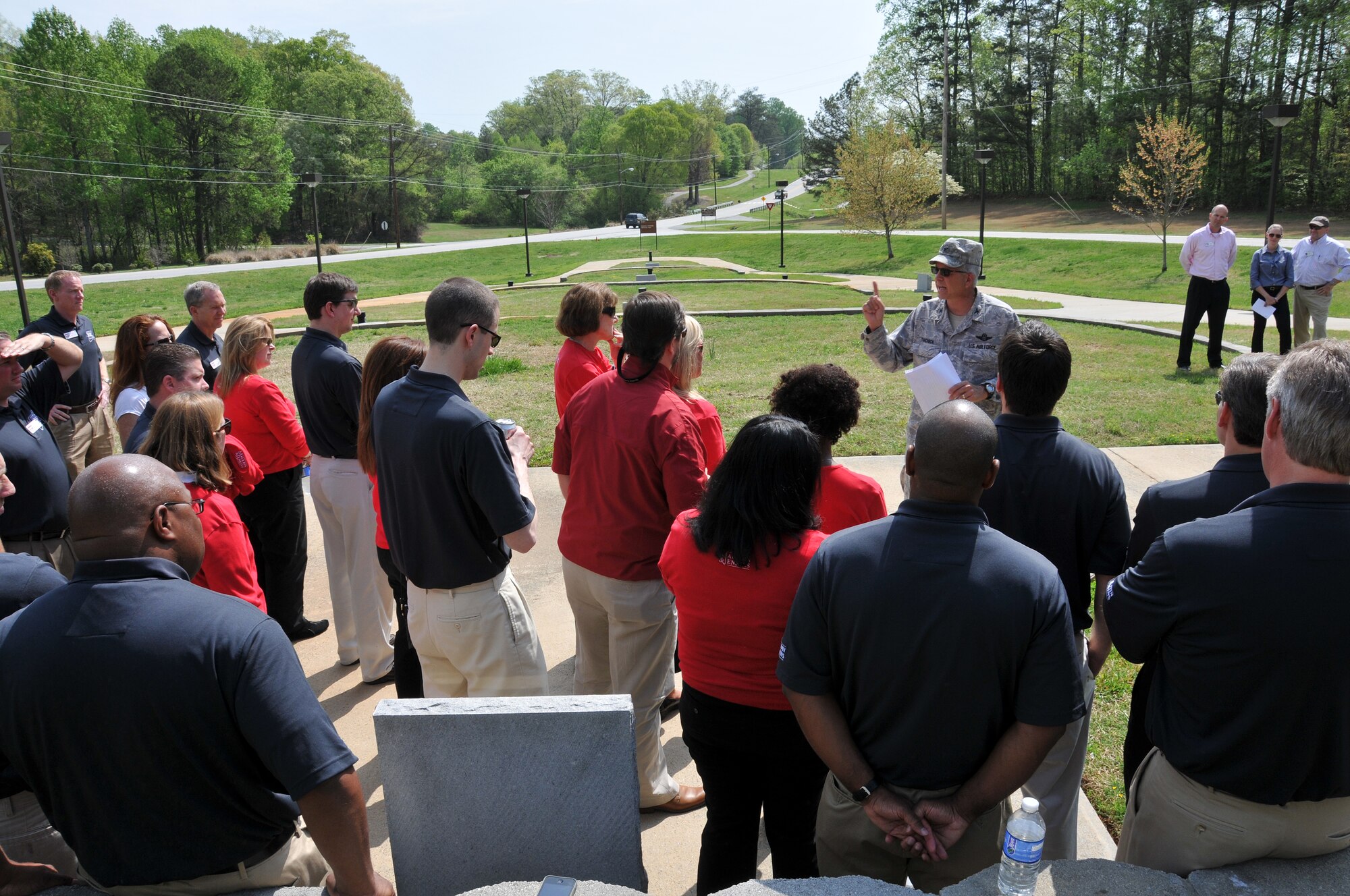 Col. Timothy Tarchick, 94th Airlift Wing commander, met with members of the Cobb Leadership program on April 17 at the POW/MIA park on Dobbins Air Reserve base. Cobb Leadership was invited to the base to learn more about the missions of the various units on Dobbins ARB. Tarchick shared his leadership philosophy and answered questions. (U.S. Air Force photo/Senior Airman Elizabeth Van Patten)