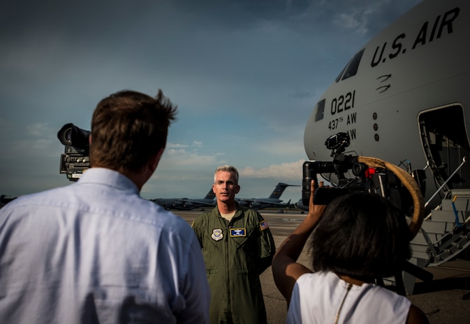 Gen. Paul Selva, Air Mobility Command commander, is interviewed by local Charleston media on the importance of the C-17 Globemaster III to the Air Force, after delivering a new C-17 Globemaster III April 25, 2013, at Joint Base Charleston – Air Base, S.C. Joint Base Charleston is scheduled to receive two additional C-17s this year, as Boeing completes work on the Air Force’s final Globemasters. The first C-17 to enter the Air Force’s inventory arrived at Charleston Air Force Base in June 1993. The C-17 is capable of rapid strategic delivery of troops and all types of cargo to main operating bases or directly to forward bases in the deployment area. (U.S. Air Force photo/ Senior Airman Dennis Sloan)