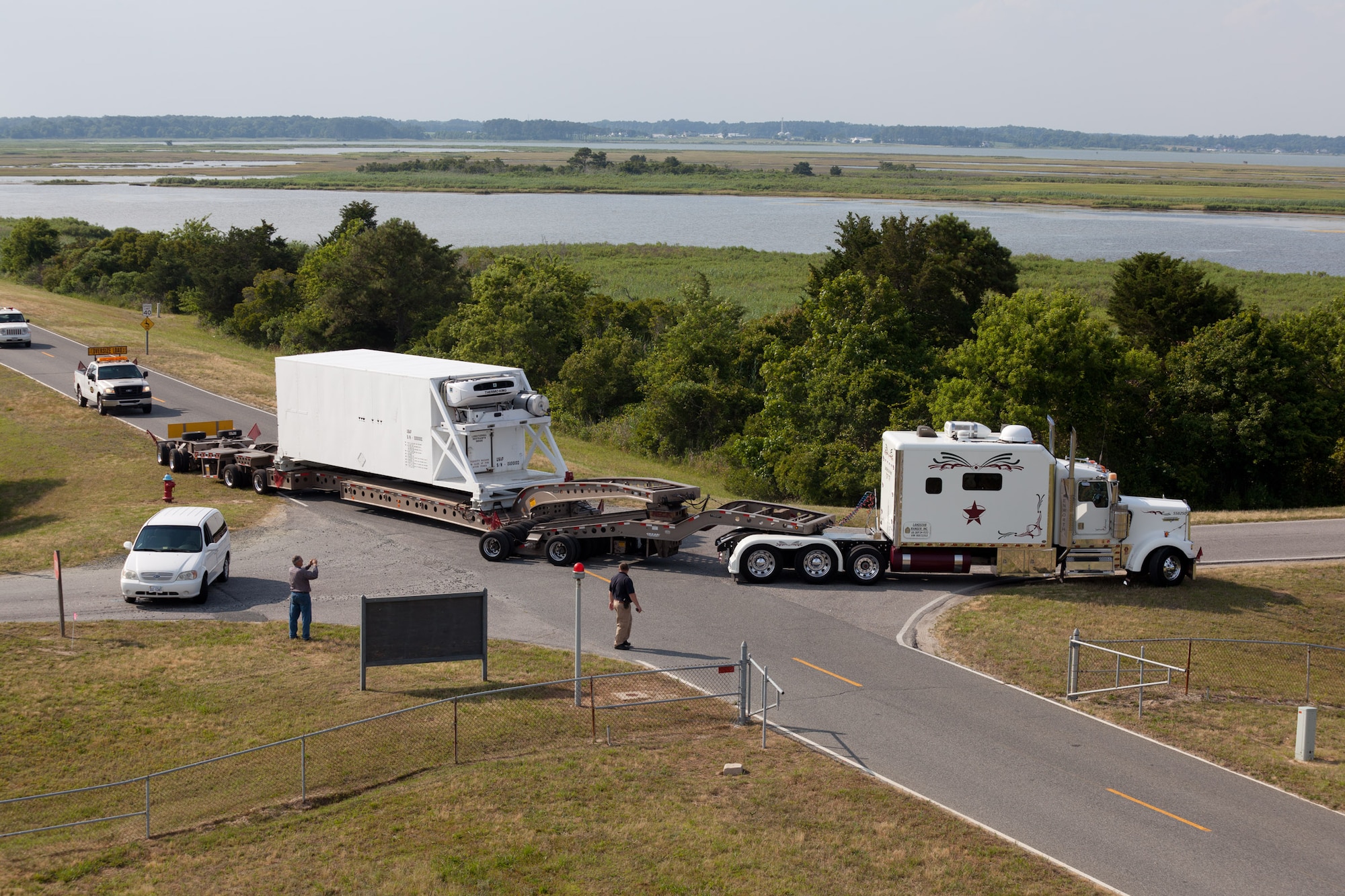 A team from Kirtland’s Space Development and Test Directorate transport a mock up of a Peacekeeper motor on a 140-foot trailer to the Wallops Flight Facility in Virginia in 2012. The exercise helped the team anticipate problems they may face in August, when they transfer several rockets to the site that will launch a NASA probe to the moon.  (Courtesy photo)