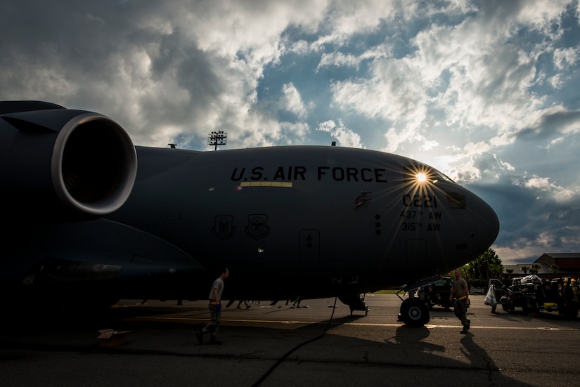 Crew Chiefs from the 437th Aircraft Maintenance Squadron perform the first recovery and maintenance checks on a new C-17 Globemaster III delivered April 25, 2013, to Joint Base Charleston – Air Base, S.C. The C-17 was delivered by Gen. Paul Selva, Air Mobility Command commander. Joint Base Charleston is scheduled to receive two additional C-17s this year, as Boeing completes work on the Air Force’s final Globemasters.  The first C-17 to enter the Air Force’s inventory arrived at Charleston Air Force Base in June 1993. The C-17 is capable of rapid strategic delivery of troops and all types of cargo to main operating bases or directly to forward bases in the deployment area. (U.S. Air Force photo/ Senior Airman Dennis Sloan)