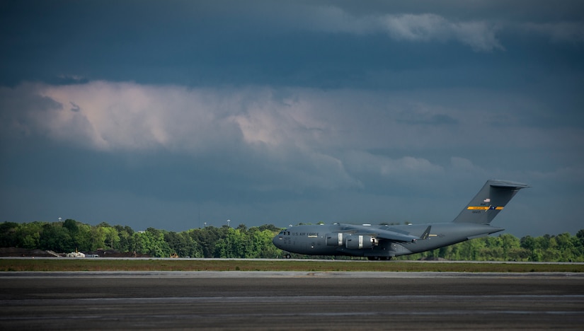 One of the last three  C-17 Globemaster IIIs flown by Gen. Paul Selva, Air Mobility Command commander, lands April 25, 2013, at Joint Base Charleston, S.C. Joint Base Charleston is scheduled to receive two additional C-17s this year, as Boeing completes work on the Air Force’s final Globemasters. The first C-17 to enter the Air Force’s inventory arrived at Charleston Air Force Base in June 1993.The C-17 is capable of rapid strategic delivery of troops and all types of cargo to main operating bases or directly to forward bases in the deployment area. (U.S. Air Force photo/ Senior Airman Dennis Sloan)