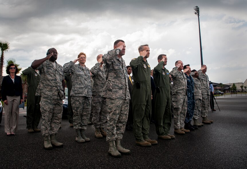 Joint Base Charleston leadership salute as Gen. Paul Selva, Air Mobility Command commander, delivers a brand new C-17 Globemaster III April 25, 2013, to Joint Base Charleston – Air Base, S.C., The first C-17 to enter the Air Force’s inventory arrived at Charleston Air Force Base in June 1993. The C-17 is capable of rapid strategic delivery of troops and all types of cargo to main operating bases or directly to forward bases in the deployment area. (U.S. Air Force photo/Senior Airman Dennis Sloan) 

