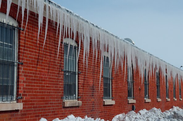 Long icicles hang from the roof of a building on F. E. Warren Air Force Base April 18. A two day spring snow storm blanketed the base with more than 19 inches of  snow. (U.S. Air Force photo by R.J. Oriez)