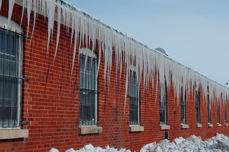 Long icicles hang from the roof of a building on F. E. Warren Air Force Base April 18. A two day spring snow storm blanketed the base with more than 19 inches of  snow. (U.S. Air Force photo by R.J. Oriez)
