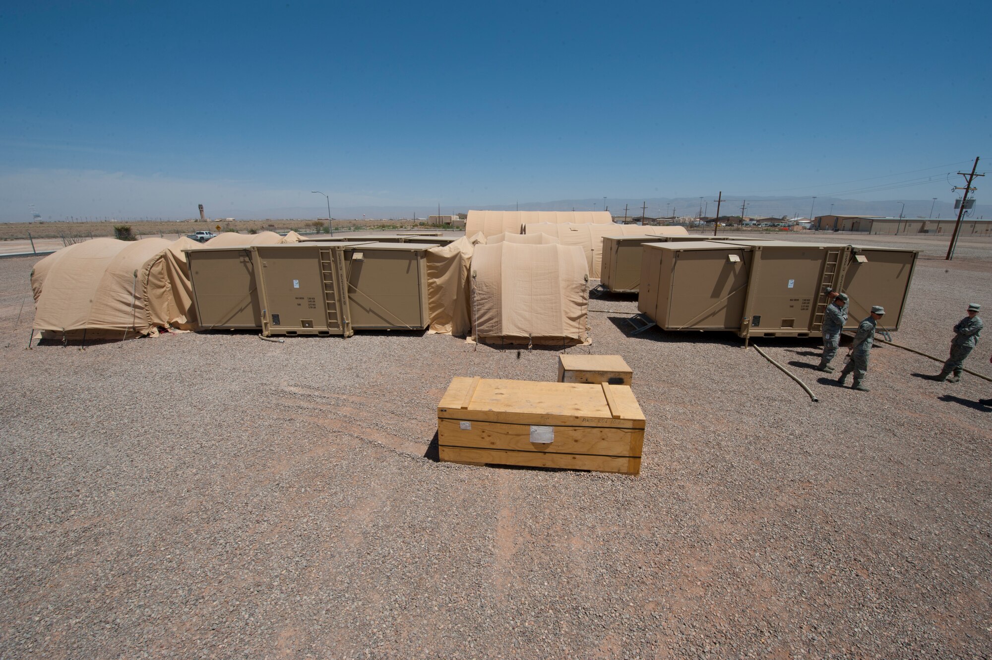 A new hygiene system is fully assembled and tested at Holloman Air Force Base, N.M., April 24. The 49th Materiel Maintenance Squadron was the first unit to receive and test the new hygiene system, complete with latrines and showers, which will eventually be utilized in forward deployed locations. The new hygiene system provides a cleaner, more private, and more durable alternative to the old systems. (U.S. Air Force photo by Airman 1st Class Daniel E. Liddicoet)