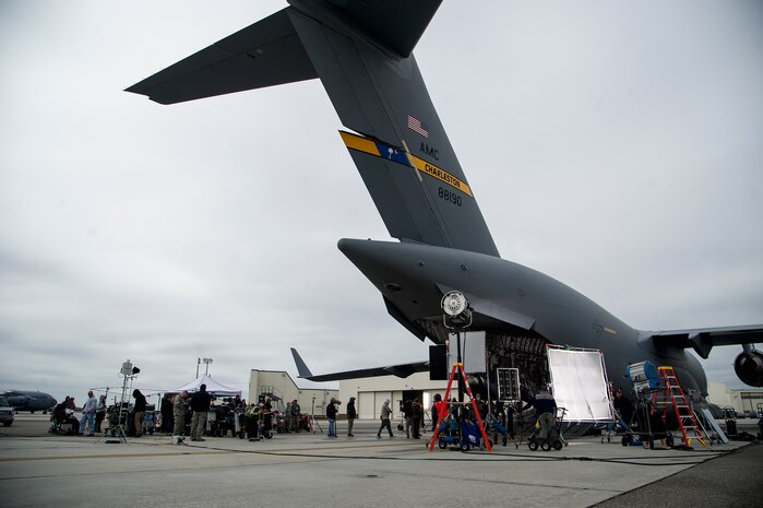 The crew of the "Army Wives" television show prepares to shoot a scene during an on-location filming session April 23, 2013 at Joint Base Charleston - Air Base, S.C. "Army Wives" tells the story of four women and one man who are brought together by their common bond - they all have military spouses. The series is based on the book "Under the Sabers: The Unwritten Code of Army Wives" by Tanya Biank and is produced by ABC Television Studio and The Mark Gordon Company. (U.S. Air Force photo/Staff Sgt. Rasheen Douglas)