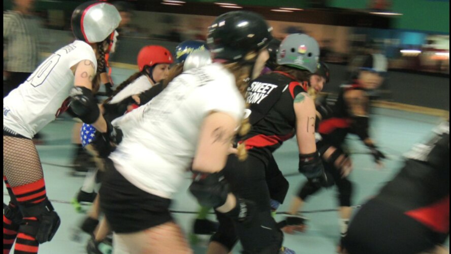 Carlye Sweet and her roller derby team, Derbal Remedy, skate in a bout in Las Cruces, N.M., April 20. Sweet is a first lieutenant at Holloman Air Force Base, N.M., who skates for fun and fitness. (Courtesy photo)