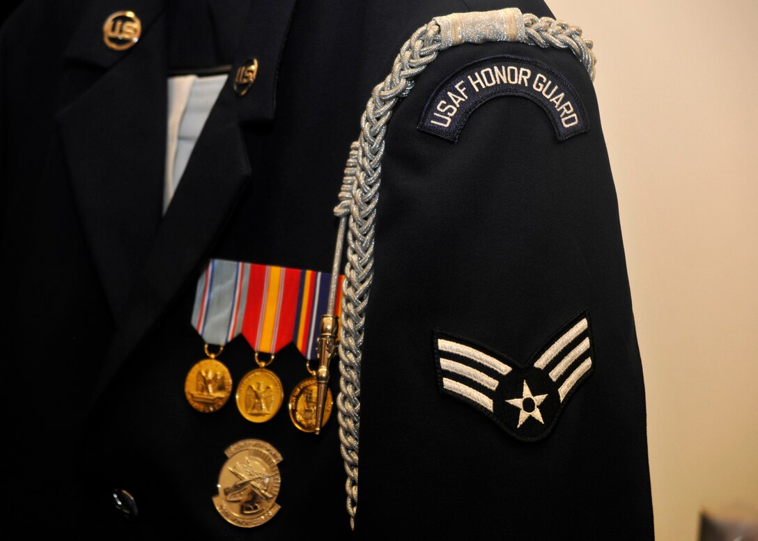 A U.S. Air Force Honor Guard Drill Team uniform hangs patiently before a performance at Indian River High School in Virginia Beach, Va. April 19, 2013. The team performed in conjunction with a POW recognition ceremony given by the school’s AFJROTC unit. (U.S. Air Force photo/Senior Airman Lindsey A. Porter)
