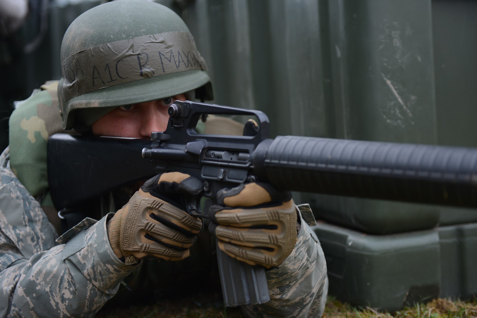 SPANGDAHLEM AIR BASE, Germany – U.S. Air Force Airman 1st Class Ryan Maxwell, 606th Air Control Squadron material management technician from Yorktown, Va., aims down the sights of an M16 rifle during a combat readiness training course April 20, 2013. Students were immersed in scenarios almost immediately and expected to perform at a high level of competency from the start. (U.S. Air Force photo by Airman 1st Class Gustavo Castillo/Released)