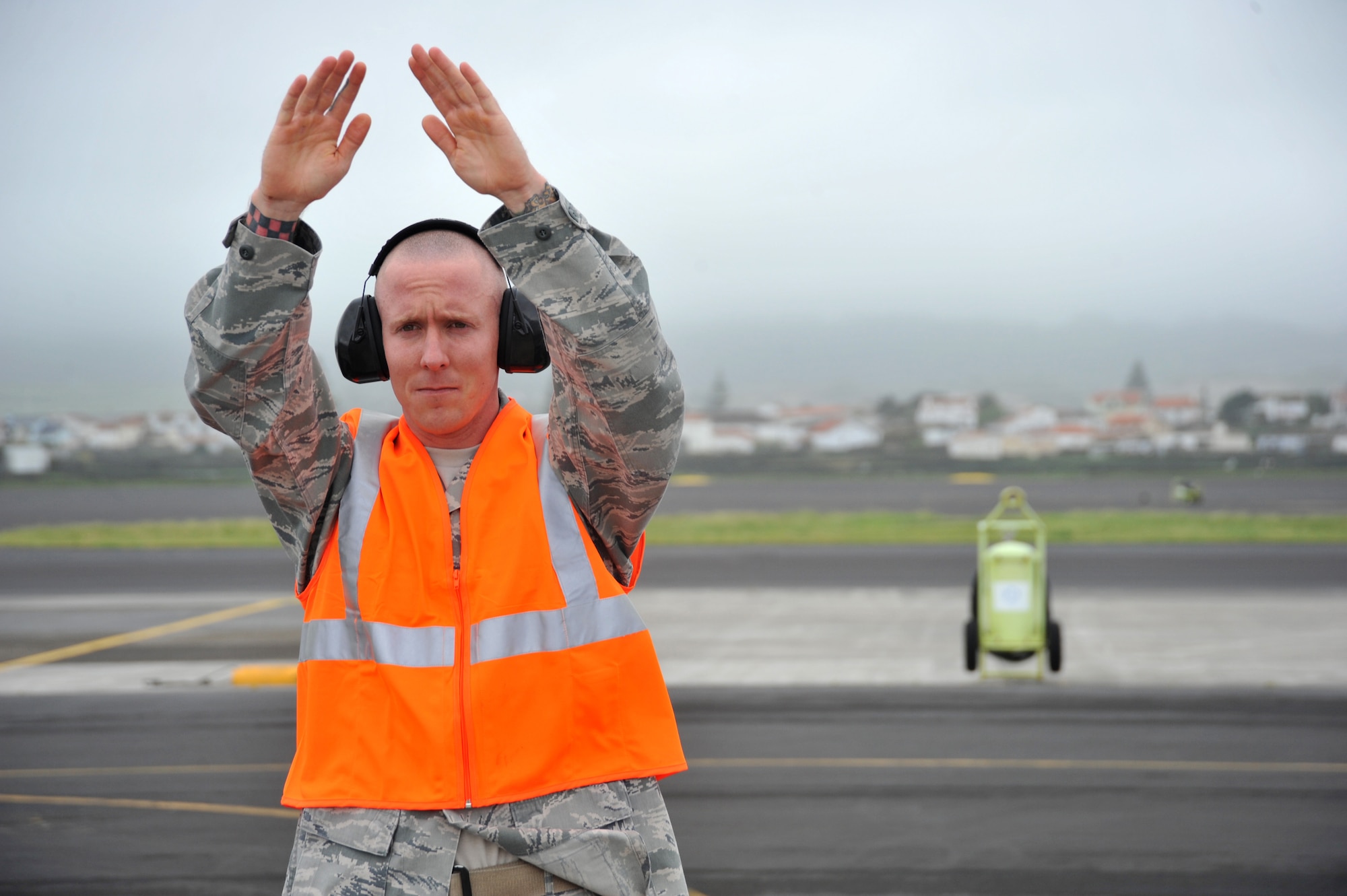 Tech. Sgt. Luke Adams, 65th Operations Squadron coronet liaison, is the first point of contact at Lajes Field for all U.S. and foreign fighter and refueling aircraft coming through, to and from Lajes. He ensures the crews' visits go as smoothly as possible by bridging the gap between them and their needs, be it fuel, equipment, food, computers, phones, base restrictions, information on local customs, etc. (U.S. Air Force photo by Staff Sgt. Angelique N. Smythe/released)