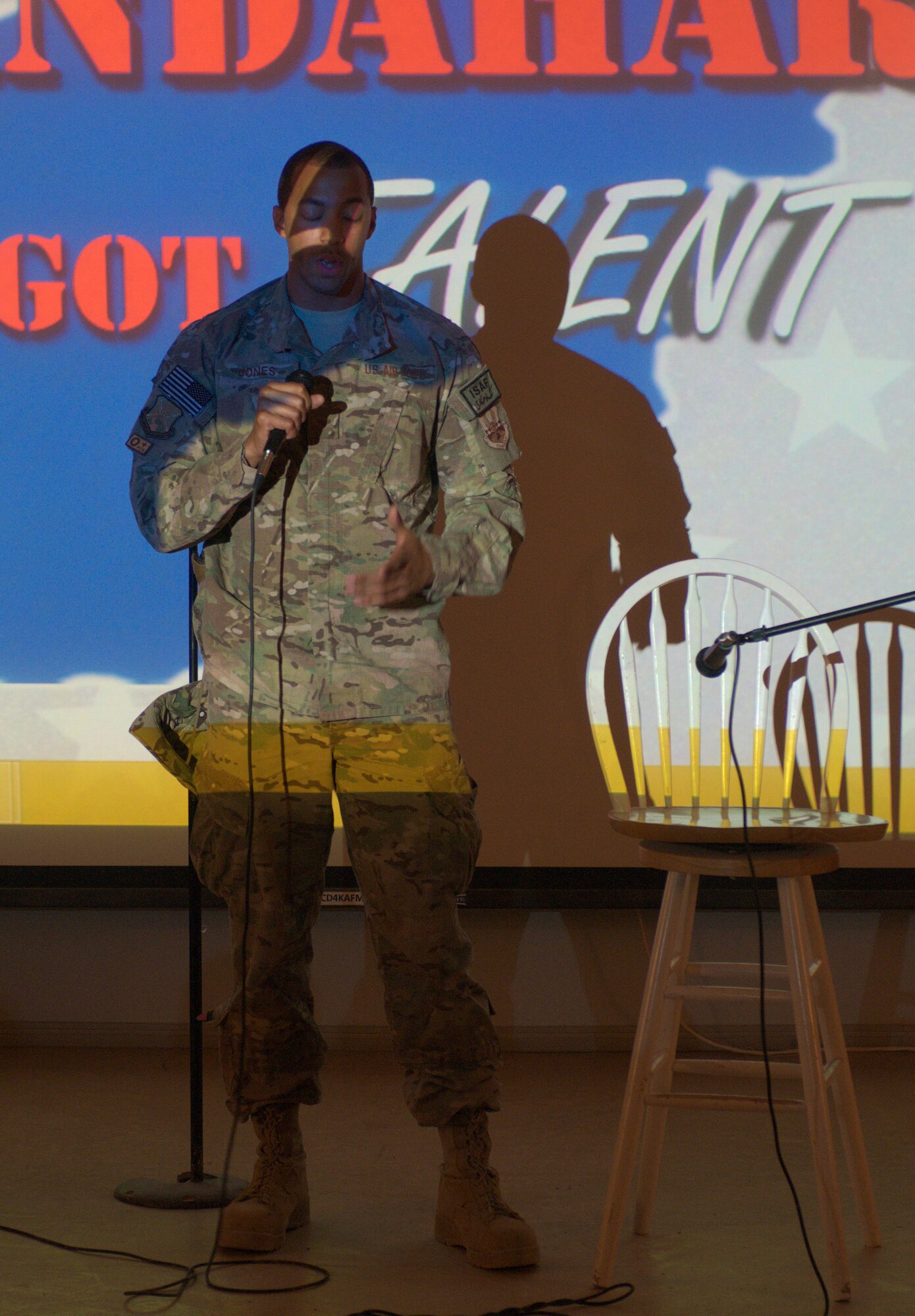 Senior Airman Robert Jones, 451st Expeditionary Logistics Readiness Squadron, sings a capella during the Kandahar’s Got Talent competition at Kandahar Air Field April 24. Eight personnel from units across Kandahar competed in the event, organized by the 451st Expeditionary Force Support Flight. (U.S. Air Force photo by Capt. Brian Maguire)