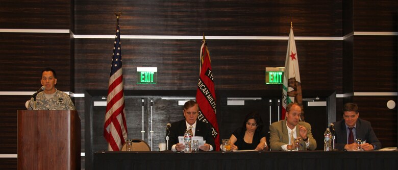Col. Mark Toy (left), commander of the U.S. Army Corps of Engineers Los Angeles District, welcomes members of the Society of American Military Engineers to a meeting held April 25 at the LA Hotel Downtown. Members participated in several panel discussions that addressed potential upcoming business opportunities for civil works and military projects in Southern California, Arizona and Nevada.