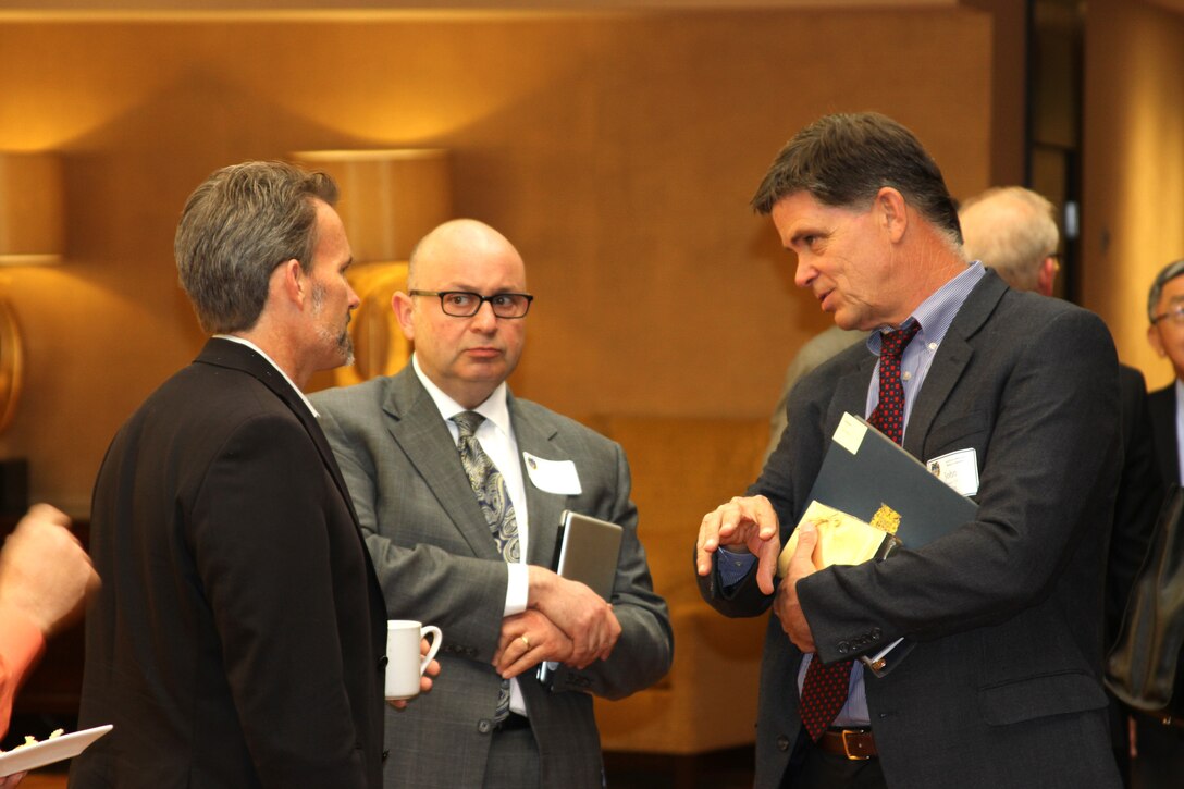 John Keever (right), chief of Construction Division at the Corps’ Los Angeles District, discusses potential Corps project with attendees at a break during the Business Opportunities Forum held April 25 at the LA Hotel Downtown. Nearly 100 members of the Society of American Military Engineers attended the forum.