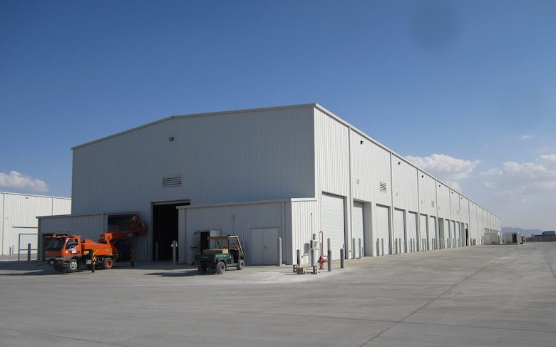 The Theater Vehicle Maintenance Facility at Kandahar Airfield, Afghanistan, received a Silver Award in an engineering competition sponsored by the American Council of Engineering Companies of Massachusetts. The facility is used to repair mine resistant, ambush-protected vehicles. (USACE photo)