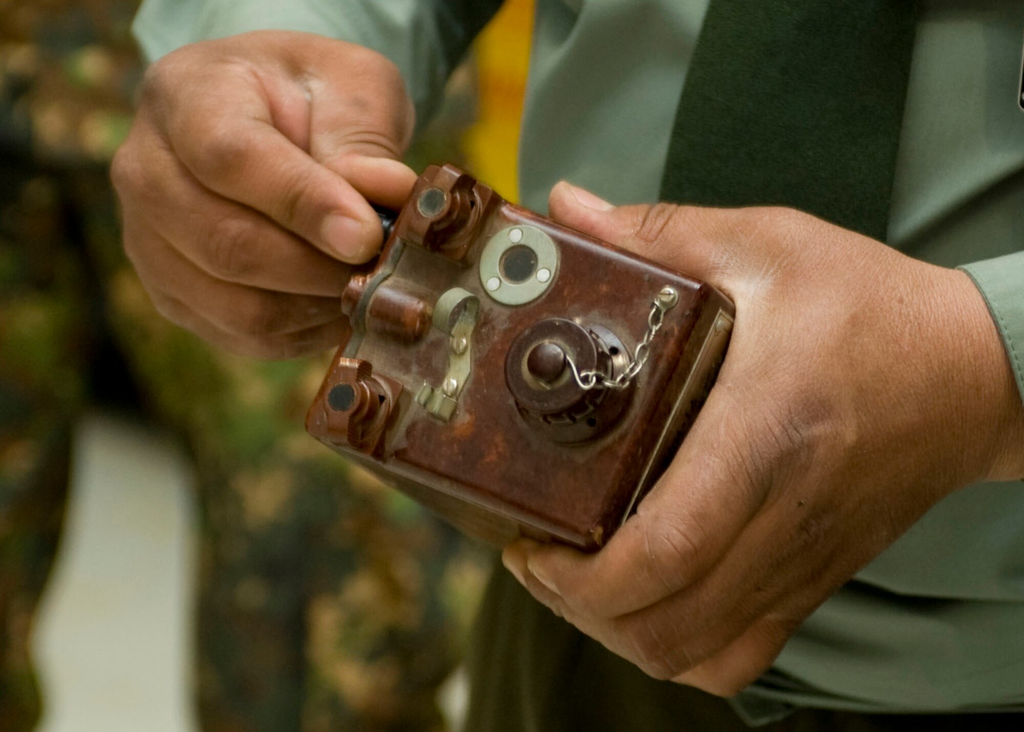 Col. Akylbek Asanov, Ministry of Defense explosive ordnance disposal officer, holds a Kyrgyz blasting cap during an EOD military exchange April, 24, 2013, at Transit Center at Manas, Kyrgyzstan.  Ministry of Defense EOD team members demonstrated to U.S. Armed Forces how they use the blasting cap to dispose of bombs and landmines. (U.S Air Force photo/Staff Sgt. Stephanie Rubi) 