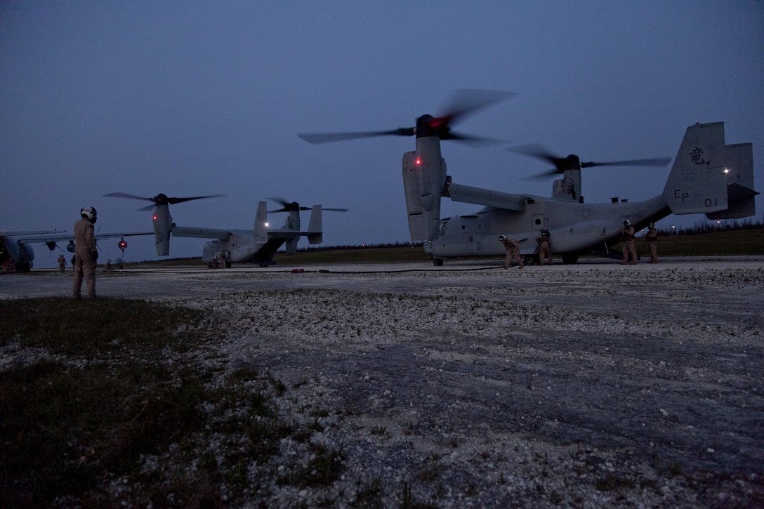 Marines refuel two MV-22B Ospreys during an aviation-delivered ground refueling exercise on Ie Shima April 15. The exercise allowed Marines to practice assembling and operating a mobile forward refueling point. The Marines are part of Marine Aerial Refueler Transport Squadron 152, Marine Aircraft Group 36, 1st Marine Aircraft Wing, III Marine Expeditionary Force. The Ospreys are assigned to Marine Medium Tiltrotor Squadron 265, MAG-36. 