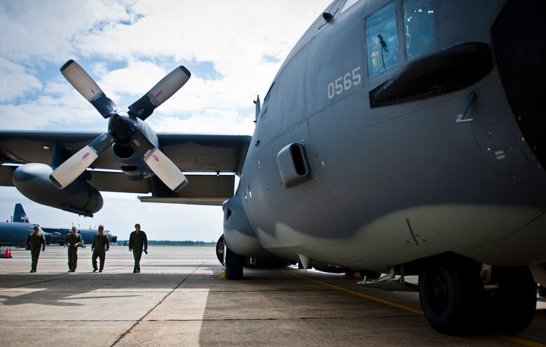 Aircrew from the 711th Special Operations Squadron take one last look at the MC-130E Combat Talon I before the aircraft’s retirement ceremony begins April 25 at Duke Field, Fla.  Aircrew, maintainers and many others turned out to remember and bid farewell to the Talon I on its official retirement from the Air Force.  The last five Talons, located at Duke Field, will be delivered to the “boneyard” at Davis-Monthan Air Force Base, N.M., by mid-May 2013.  (U.S. Air Force photo/Tech. Sgt. Samuel King Jr.)