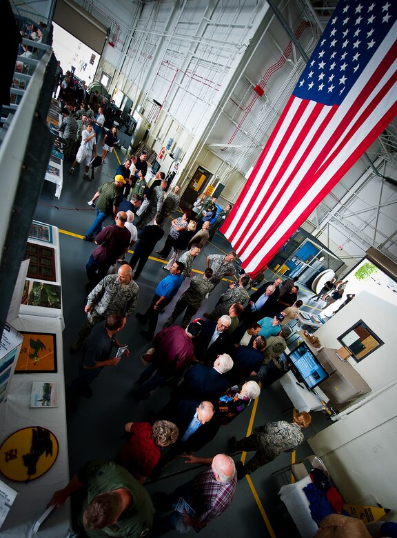 Airmen and civilians check out the displays prior to the retirement ceremony for the MC-130E Combat Talon I at Duke Field, Fla., April 25.  Aircrew, maintainers and many others turned out to remember and bid farewell to the Talon I on its official retirement from the Air Force.  The last five Talons, located at Duke Field, will be delivered to the “boneyard” at Davis-Monthan Air Force Base, N.M., by mid-May 2013.  (U.S. Air Force photo/Tech. Sgt. Samuel King Jr.)