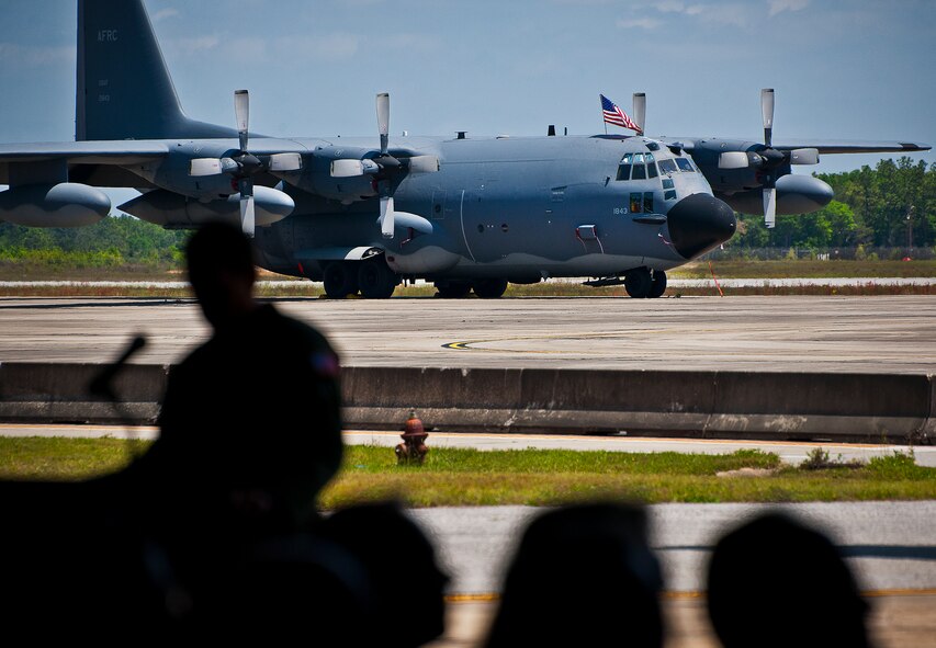 Lt. Col. Daniel Flynn, the 711th Special Operations Squadron commander, talks to the crowd about the many Reserve accomplishments that took place with the MC-130E Combat Talon I at the retirement ceremony for the aircraft at Duke Field, Fla., April 25.  Flynn spoke about the numerous missions in support of Operation Enduring and Iraqi Freedom as well as humanitarian missions after Hurricane Katrina and the Haiti earthquake.  Aircrew, maintainers and many others turned out to remember and bid farewell to the Talon I on its official retirement from the Air Force.  The last five Talons, located at Duke Field, will be delivered to the “boneyard” at Davis-Monthan Air Force Base, N.M., by mid-May 2013.  (U.S. Air Force photo/Tech. Sgt. Samuel King Jr.)
