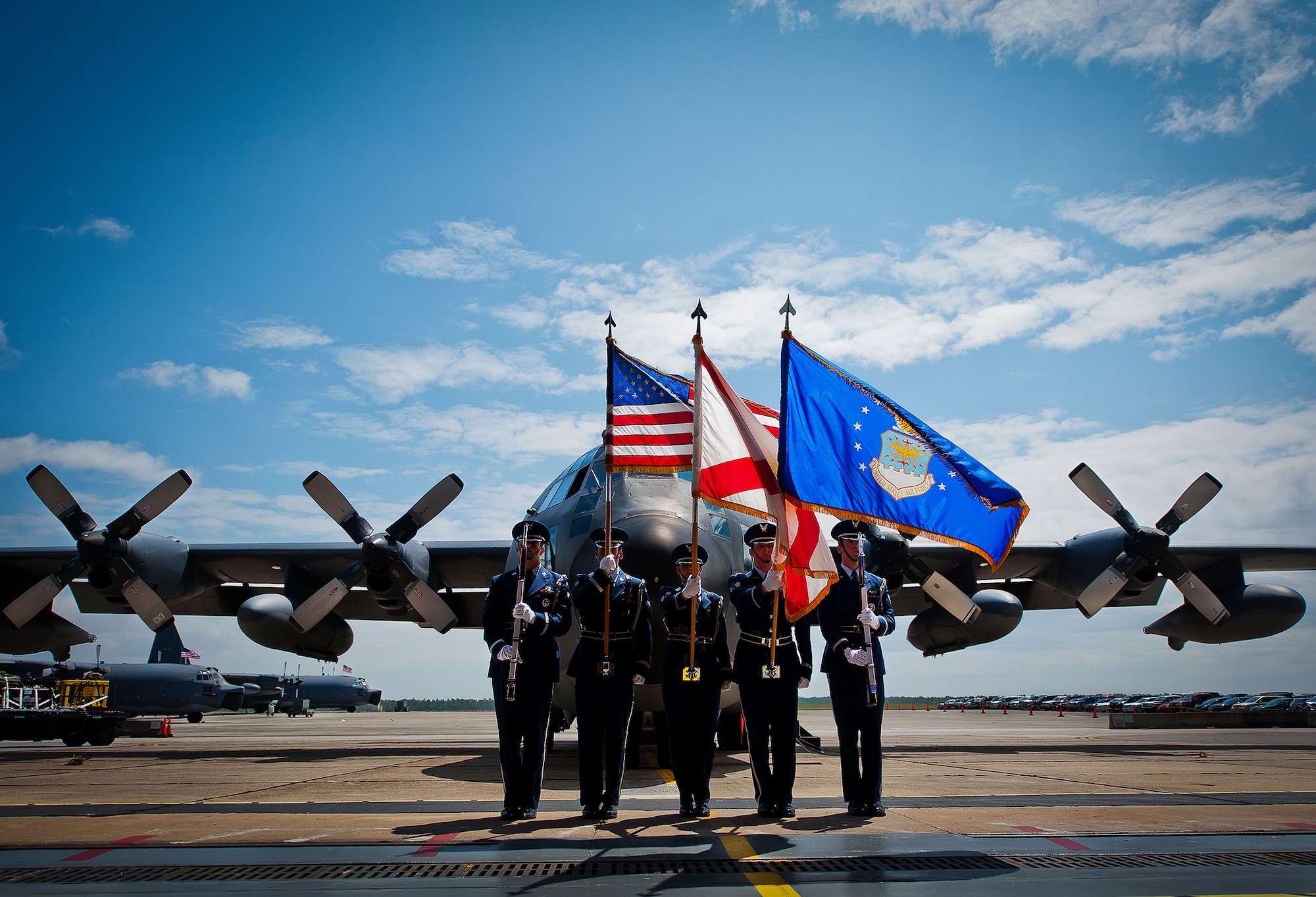 The Eglin Honor Guard presents the colors in the shadow of an MC-130E Combat Talon I during its retirement ceremony at Duke Field, Fla., April 25.  Aircrew, maintainers and many others turned out to remember and bid farewell to the Talon I on its official retirement from the Air Force.  The last five Talons, located at Duke Field, will be delivered to the “boneyard” at Davis-Monthan Air Force Base, N.M., by mid-May 2013.  (U.S. Air Force photo/Tech. Sgt. Samuel King Jr.)