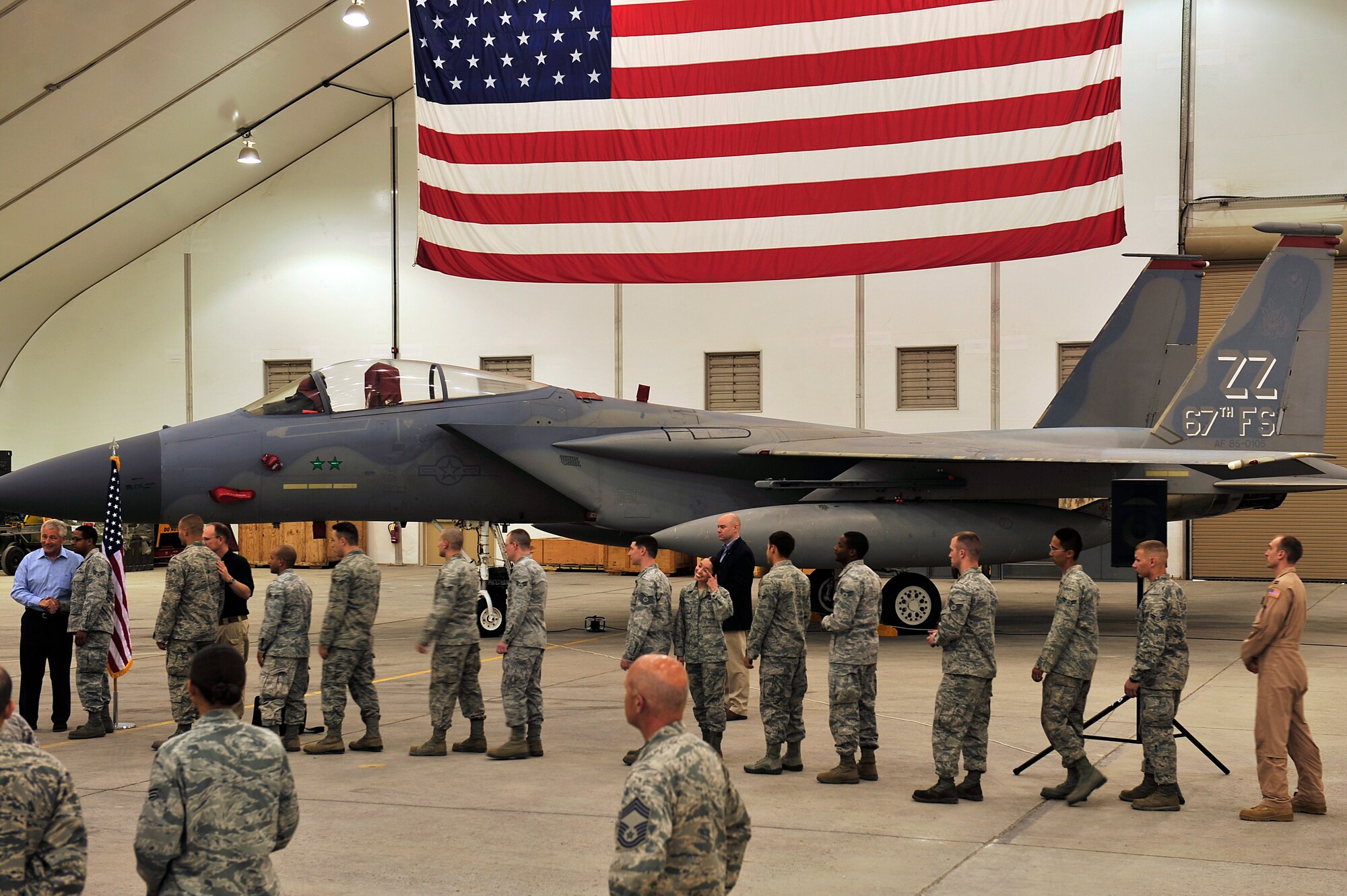 U.S. Defense Secretary Chuck Hagel personally greets more than 200 Airmen, Soldiers and Sailors at the 380th Air Expeditionary Wing in Southwest Asia April 25, 2013. Hagel thanked servicemembers for their dedication and discussed relevant topics, including tuition assistance and sequestration. (U.S. Air Force photo by Tech. Sgt. Christina M. Styer)     