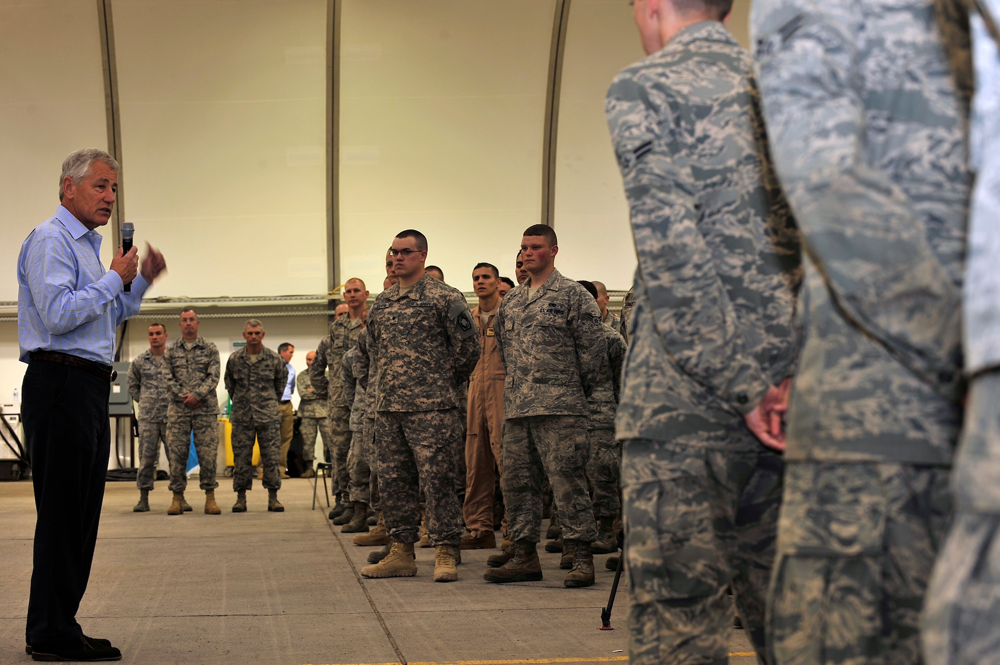 U.S. Defense Secretary Chuck Hagel speaks to Airmen, Soldiers and Sailors at the 380th Air Expeditionary Wing in Southwest Asia April 25, 2013. Hagel thanked servicemembers for their dedication and discussed relevant topics, including tuition assistance and sequestration. (U.S. Air Force photo by Tech. Sgt. Christina M. Styer)