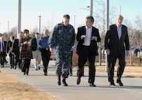 PETERSON AIR FORCE BASE, Colo. - Navy Adm. James Winnefeld, North American Aerospace Defense Command and U.S. Northern Command commander, escorts members of the Canadian Embassy and consulates to NORAD and USNORTHCOM headquarters at the beginning of a visit to the commands Feb. 15. The purpose of the visit was to educate the members of the Canadian Consulate Heads of Mission about the missions of NORAD as well as those assumed by USNORTHCOM after the Sept. 11, 2001, attacks in connection with homeland defense. More than 20 Embassy and consulate staff members received briefings on the NORAD and USNORTHCOM missions and tours of the NORAD and USNORTHCOM Command Center and Cheyenne Mountain Air Force Station. 

(U.S. Air Force photo by Staff Sgt. Thomas J. Doscher)

