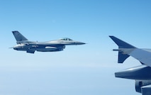 OVER THE GULF OF MEXICO - An F-16 fighter from the 138th Fighter Wing, Detachment 1, comes up alongside a Canadian CC-150 during an Amalgam Mute exercise March 15. The North American Aerospace Defense Command Inspector General's Office conducts periodic inspections of NORAD's alert units, testing their ability to employ and control fighters in a variety of scenarios. 

(U.S. Air Force photo by Tech. Sgt. Thomas J. Doscher) 

