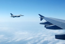 OVER THE GULF OF MEXICO - An F-16 fighter from the 138th Fighter Wing, Detachment 1, comes up alongside a Canadian CC-150 during an Amalgam Mute exercise March 15. The North American Aerospace Defense Command Inspector General's Office conducts periodic inspections of NORAD's alert units, testing their ability to employ and control fighters in a variety of scenarios. 

(U.S. Air Force photo by Tech. Sgt. Thomas J. Doscher) 

