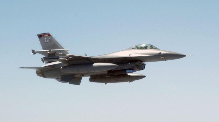 OVER THE GULF OF MEXICO - An F-16 fighter from the 138th Fighter Wing, Detachment 1, comes up alongside a Canadian CC-150 during an Amalgam Mute exercise March 15. The North American Aerospace Defense Command Inspector General's Office conducts periodic inspections of NORAD's alert units, testing their ability to employ and control fighters in a variety of scenarios. In the inspection scenario, fighters had to enforce a temporary flight restriction and then respond to a simulated distress call from a Canadian CC-150 reporting a disturbance in the cockpit. 

(U.S. Air Force photo by Tech. Sgt. Thomas J. Doscher) 

