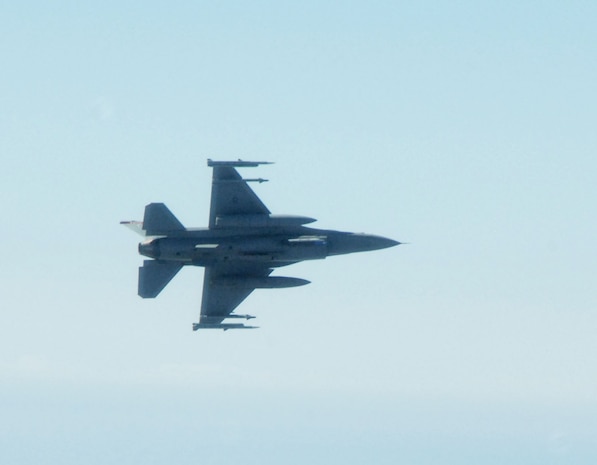 OVER THE GULF OF MEXICO - An F-16 fighter from the 138th Fighter Wing, Detachment 1, breaks off from a Canadian CC-150 following an Amalgam Mute exercise March 15. The North American Aerospace Defense Command Inspector General's Office conducts periodic inspections of NORAD's alert units, testing their ability to employ and control fighters in a variety of scenarios. In the inspection scenario, fighters had to enforce a temporary flight restriction and then respond to a simulated distress call from a Canadian CC-150 reporting a disturbance in the cockpit. 

(U.S. Air Force photo by Tech. Sgt. Thomas J. Doscher) 

