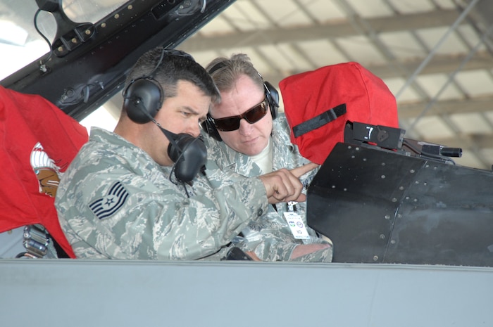 ELLINGTON FIELD, Texas - Master Sgt. Tim Miller, North American Aerospace Defense Command Inspector General's Office, observes Tech. Sgt. Chris Hase, 138th Fighter Wing, Detachment 1, aircraft armament systems specialists, during a functional test of an F-16 aircraft during an Amalgam Mute inspection March 15. NORAD inspectors test and observe every facet of an alert unit's ability to conduct their NORAD alert mission, including maintenance, security, safety, employment and control. 

(U.S. Air Force photo by Tech. Sgt. Thomas J. Doscher) 

