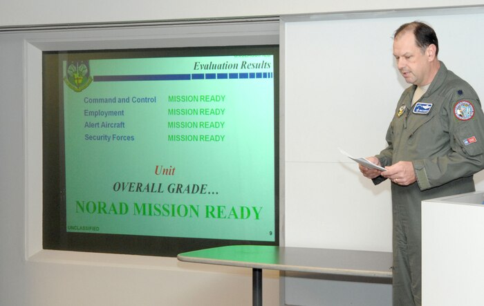 ELLINGTON FIELD, Texas - Lt. Col. Drexel Sherman, North American Aerospace Defense Command Inspector General Fighter Team Chief, gives members of the 138th Fighter Wing, Detachment 1, a report on the results of the IG team's inspection March 16. The alert facility was rated NORAD Mission Ready by the IG, and four Det. 1 members were identified as superior performers. 

(U.S. Air Force photo by Tech. Sgt. Thomas J. Doscher) 

