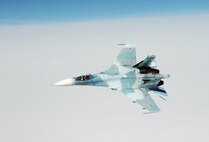OVER THE PACIFIC OCEAN – An SU-27 fighter moves into position to  escort a simulated hijacked airliner during the second day of flying for Exercise Vigilant Eagle Aug. 9, 2011. Russian fighters followed and monitored the aircraft while it was in Russian airspace, handing it over to U.S. F-15 fighters from Elmendorf Air Force Base, Alaska, when it entered U.S. airspace. (U.S. Air Force photo by Tech. Sgt. Thomas J. Doscher)

