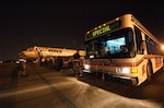 A group of displaced citizens from New Orleans board a bus at the Kentucky Air National Guard Base in Louisville Aug. 30 for transportation to a Red Cross Shelter. The flight's 178 displaced arrived at the Kentucky Air Guard Base aboard a commercial airliner.