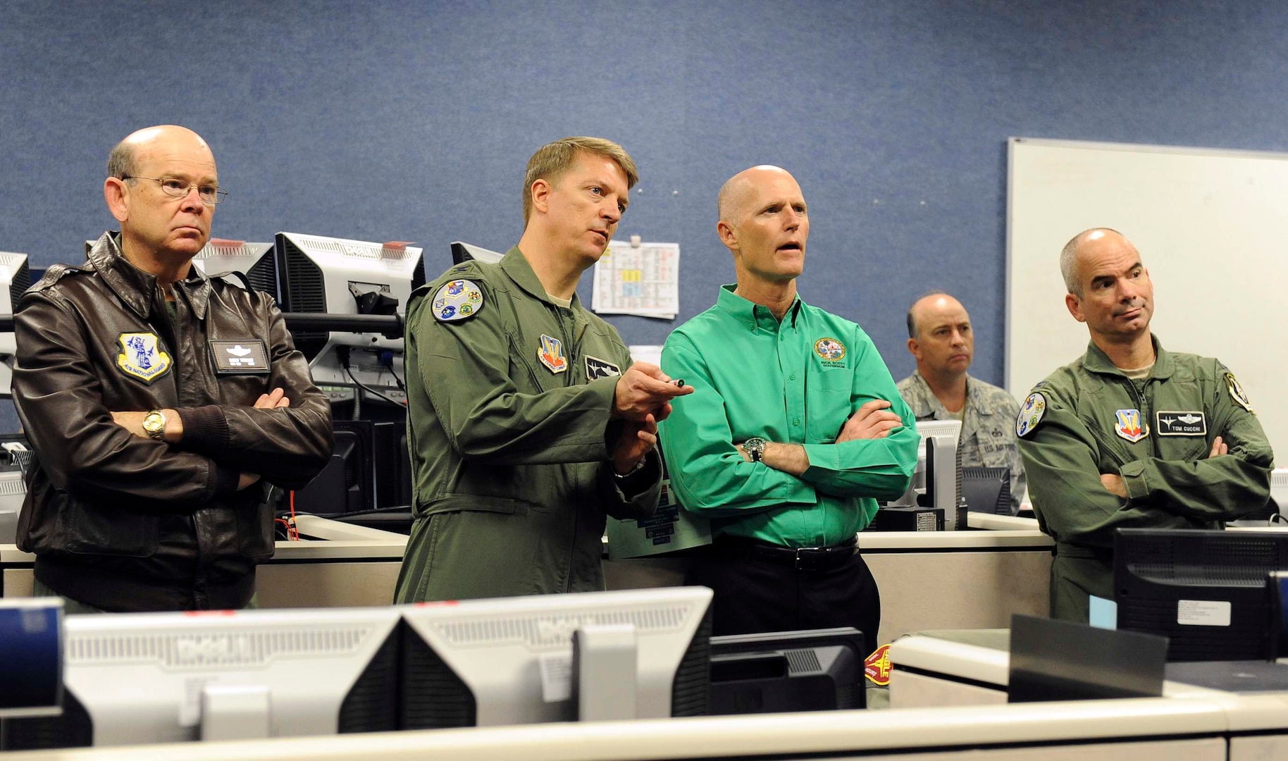 TYNDALL AIR FORCE BASE, Fla. - Col. Randy Spear (second from left), 601st Air and Space Operations Center commander, points out a simulated "track of interest" on a radar screen during an exercise to Florida Gov. Rick Scott at Tyndall Air Force Base, Fla., Jan. 5. Scott came to Tyndall to visit with Florida Air National Guardsmen from the 101st Air and Space Operations Group, which provides the manning for the 601st AOC, and to see firsthand the capabilities and assets Tyndall has to offer. 

(U.S. Air Force photo by Lisa Norman) 


