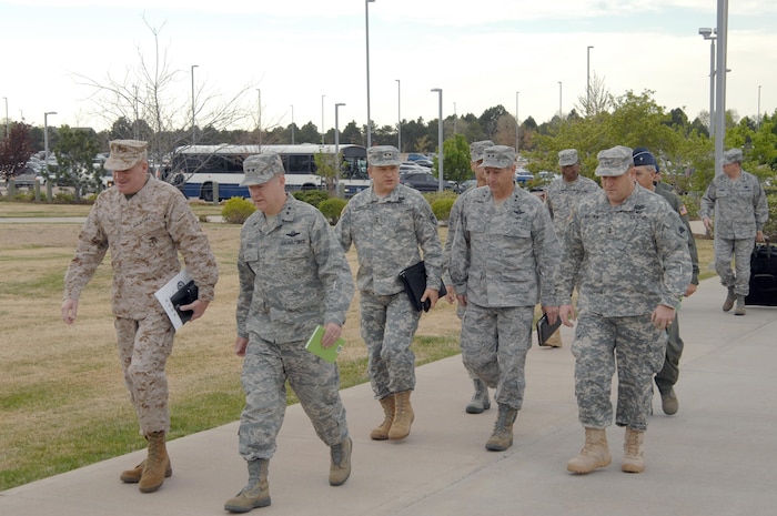 PETERSON AIR FORCE BASE, Colo. - National Guard adjutants general arrive at NORAD and USNORTHCOM headquarters May 1, 2012, to meet with NORAD and USNORTHCOM leadership. The general officers, representing all of the states with the ACA mission, met with NORAD and USNORTHCOM commander, Army Gen. Charles Jacoby, to discuss the ACA mission, the NORAD campaign plan and emerging U.S. defense strategy. 

(U.S. Air Force photo by Tech. Sgt. Thomas J. Doscher) 

