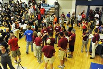 U.S. AIR FORCE ACADEMY, Colo. - Volunteers, center, meet before assisting during sitting volleyball games during Warrior Games 2012 at the U.S. Air Force Academy in Colorado Springs, Colo., May 3, 2012. 

(U.S. Air Force photo by Val Gempis) 

