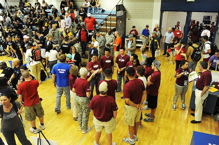 U.S. AIR FORCE ACADEMY, Colo. - Volunteers, center, meet before assisting during sitting volleyball games during Warrior Games 2012 at the U.S. Air Force Academy in Colorado Springs, Colo., May 3, 2012. 

(U.S. Air Force photo by Val Gempis) 

