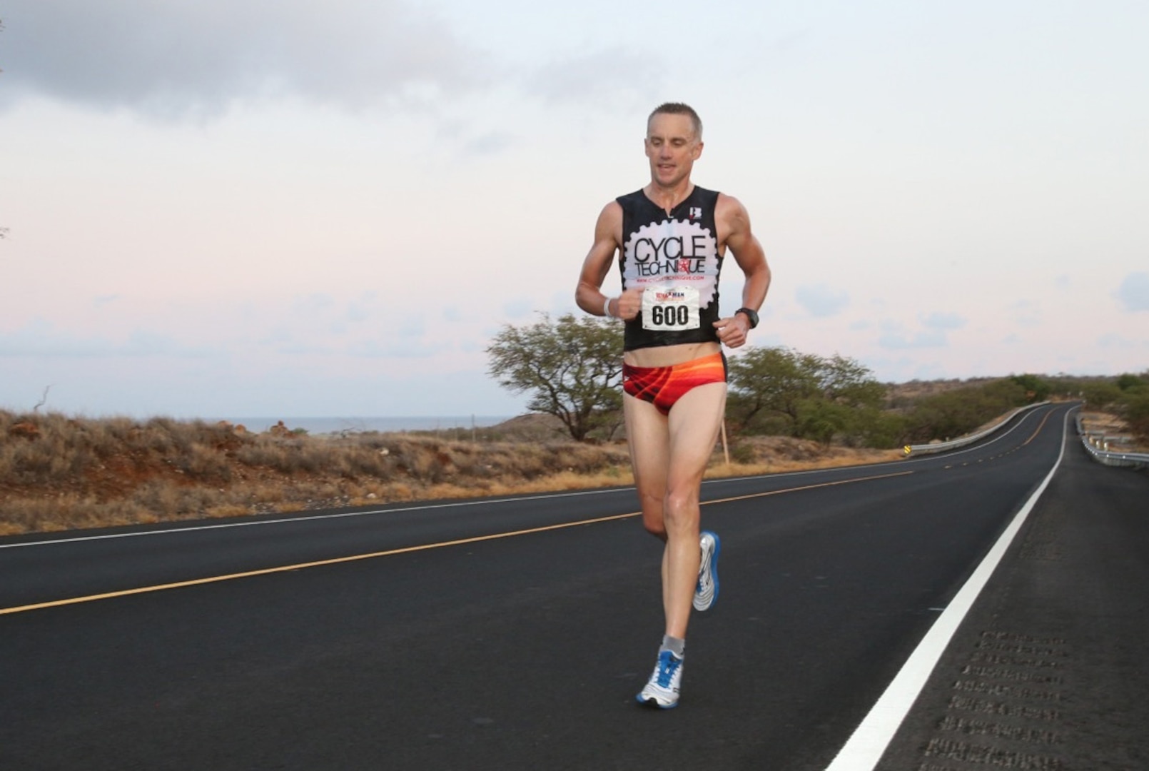 HAWAII – After an amazing recovery from serious leg injuries suffered during a bicycle accident 14 months earlier, Lieutenant-Colonel Tony O’Keeffe runs a double marathon during the final phase of the grueling three-day 2012 Ultraman Triathlon World Championships race from 23 to 25 November in Hawaii, finishing fourth overall. O’Keefe is a Royal Canadian Air Force officer currently serving at North American Aerospace Defense Command in Colorado Springs, Colo. 

(Photo by Rick Kent) 

