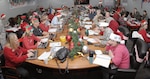 PETERSON AIR FORCE BASE, Colo. - Volunteers for NORAD Tracks Santa answer phone calls and emails from people throughout the world trying to find the location of Santa Claus Dec. 24, 2012. More than 1,200 volunteers answered 114,000 phone calls during a 24-hour period. (U.S. Air Force photo by Tech. Sgt. Thomas J. Doscher)