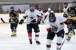 CANADIAN FORCES BASE SUFFIELD, Canada - NORAD’s hockey team beat Canadian Forces Base Suffield 7-1 in the final game of the 2013 Annual Canadian Forces Prairie Region Small Base Hockey Championship Feb. 7. The NORAD team, drawing from units across North America, beat the rival team from Suffield in front of a packed house on Suffield’s own ice. 

(Courtesy photo) 

