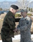 PETERSON AIR FORCE BASE, Colo. - Army Gen. Charles H. Jacoby, Jr., NORAD and USNORTHCOM commander, greets General Harald Sunde, Norwegian Chief of Defense Staff, upon his arrival at NORAD and USNORTHCOM headquarters Feb. 13. Sunde, the Norwegian equivalent of the U.S. Chairman of the Joint Chiefs of Staff, is visiting to conduct talks to NORAD and USNORTHCOM leadership. During his visit, he received tours of the NORAD and USNORTHCOM Command Center and the Cheyenne Mountain complex. (U.S. Air Force photo by Tech. Sgt. Thomas J. Doscher)