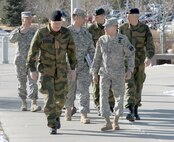 PETERSON AIR FORCE BASE, Colo. - Army Gen. Charles H. Jacoby, Jr., NORAD and USNORTHCOM commander, and General Harald Sunde, Norwegian Chief of Defense Staff, talk as they begin a tour of NORAD and USNORTHCOM headquarters Feb. 13. Sunde, the Norwegian equivalent of the U.S. Chairman of the Joint Chiefs of Staff, is visiting to conduct talks to NORAD and USNORTHCOM leadership. During his visit, he received tours of the NORAD and USNORTHCOM Command Center and the Cheyenne Mountain complex. (U.S. Air Force photo by Tech. Sgt. Thomas J. Doscher)