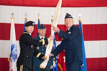 TYNDALL AIR FORCE BASE, Fla. - Army Gen. Charles H. Jacoby, Jr. NORAD and USNORTHCOM Commander, presents the flag to Air Force Lt. Gen. William H. Etter during the change of command ceremony at Tyndall Air Force Base on March 8. Lt. Gen. Etter assumed command of First Air Force (AFNORTH) and the Continental NORAD Region (CONR) from Lt. Gen. Stanley E. "Sid" Clark III, who will become the new director of the Air National Guard. 

(U.S. Air Force photo by Lisa Norman) 

