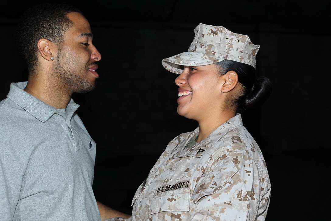 Tevin Speight and Catherine Oliva-Speight are not the typical Marine Corps couple. They were together for two and a half years before Catherine became a Marine. Catherine graduated from boot camp on February 28, 2012. Once Catherine started her career, she married Tevin. They got married on January 4. 