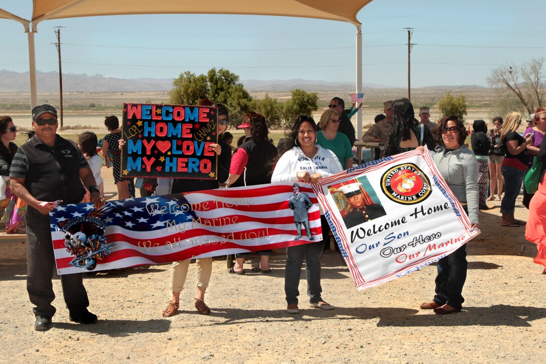 Families and loved ones await the return of Marines with 2nd Battalion, 7th Marine Regiment after a seven month deployment to Afghanistan in support of Operation Enduring Freedom during the battalion's homecoming ceremony April 9, 2013. 