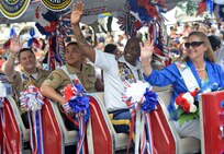 The 2013 Military Ambassadors for Joint Base San Antonio took part in the Battle of Flowers Parade as part of the Fiesta celebration activities April 26, at the Alamo Plaza San Antonio Texas. (U.S. Air Force photo by Benjamin Faske) (released)