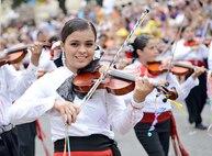 The 2013 Battle of Flowers Parde showcased a wide array of different floats and historical societies as part of the Fiesta celebration April 26, at the Alamo Plaza, San Antonio Texas. The Battle of Flowers parade is the largest and oldest Fiesta event in San Antonio.(U.S. Air Force photo by Benjamin Faske) (released)