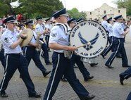The U.S. Air Force Band of the West, marched in the 2013 Battle of Flowers Parade as part of the Fiesta celebration April 26, at the Alamo Plaza San Antonio Texas. (U.S. Air Force photo by Benjamin Faske) (released)